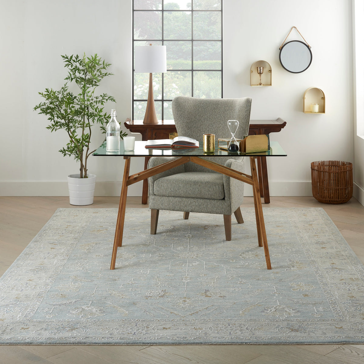 A blue patterned rug in a welcoming living room ready for guests