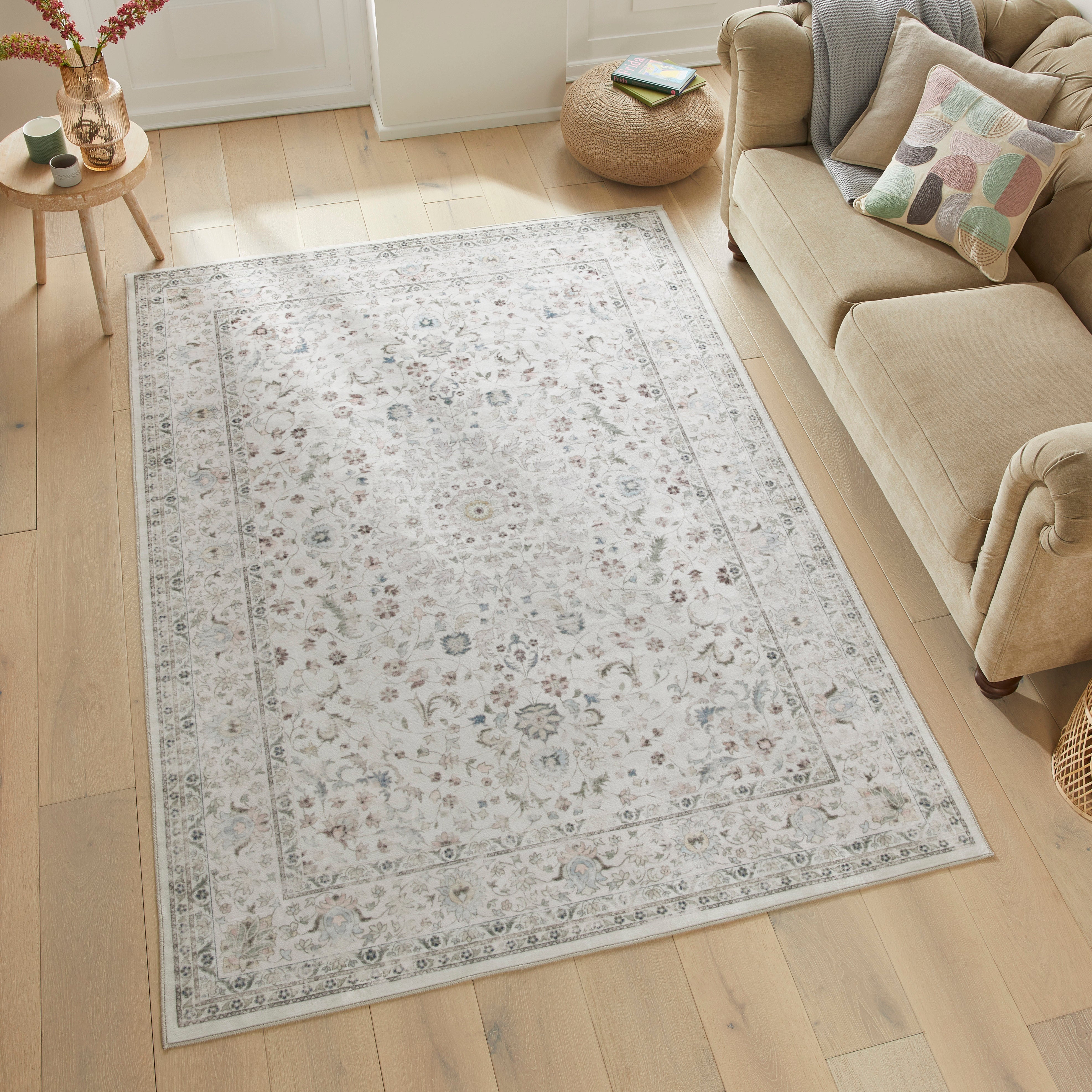 A cream machine-washable rug suited to a nursery or children's room