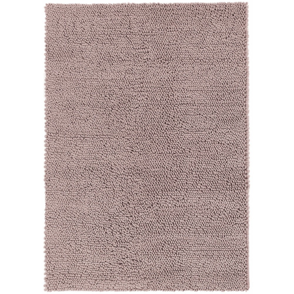 A pale neutral hand-woven wool rug, a sound first purchase
