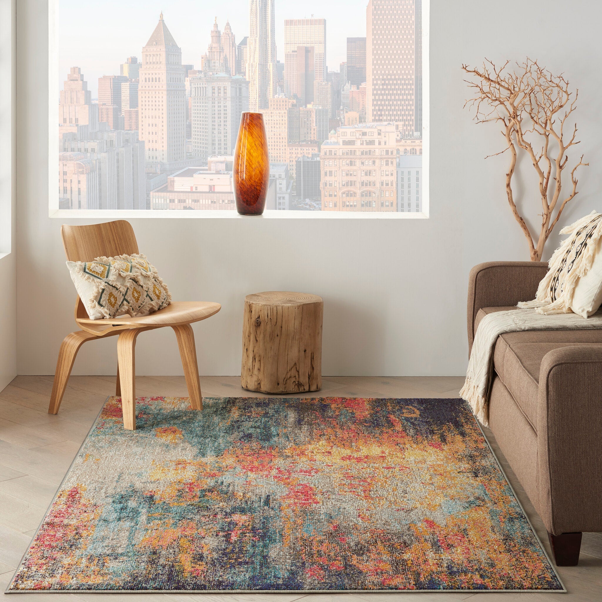 A multicoloured patterned rug that sits well alongside other textiles