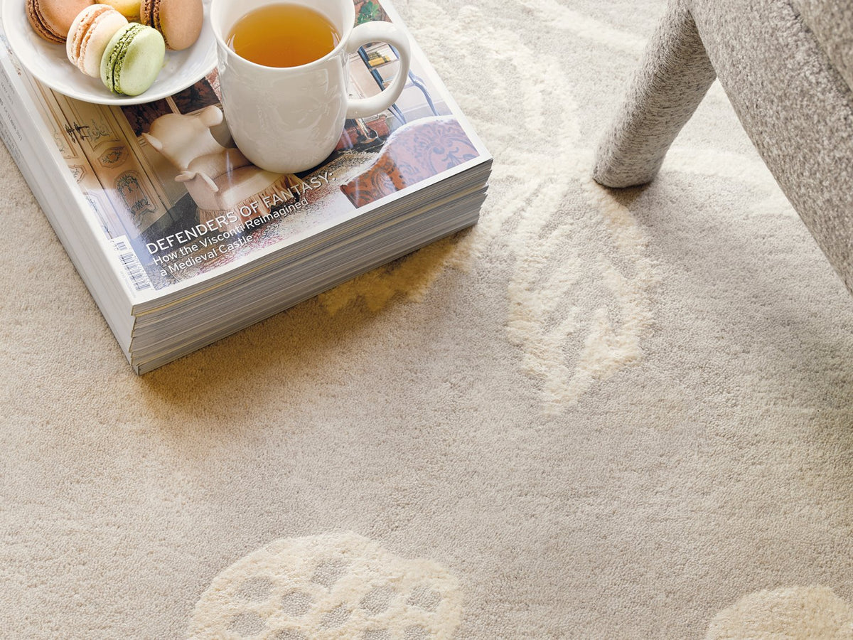Wedgwood Wild Strawberry Tonal 38201 rug styled in a room setting