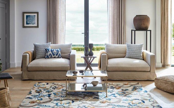 Sanderson Amanpuri Stone 145101 rug styled in a room setting