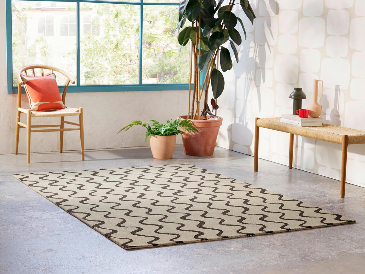 Scion Ribbon Charcoal rug styled in a room setting