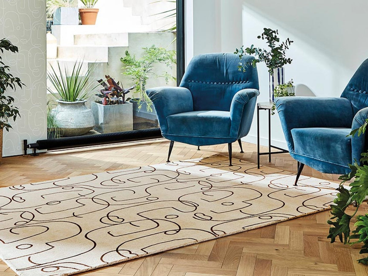 Scion Epsilon Charcoal rug styled in a room setting