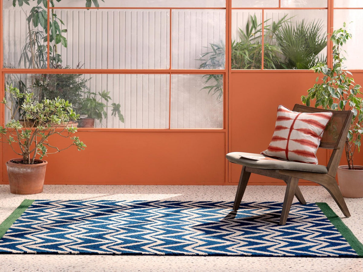 Scion Dhurrie Blue outdoor rug on a terrace