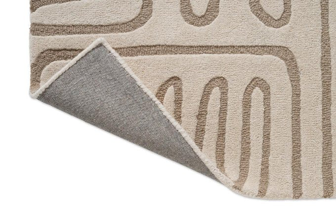 Harlequin Hollow Pebble 141101 rug corner turned to show the backing