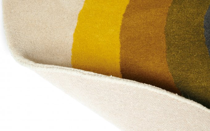 Orla Kiely Sunflower Yellow Round 60006 rug turned to show the backing