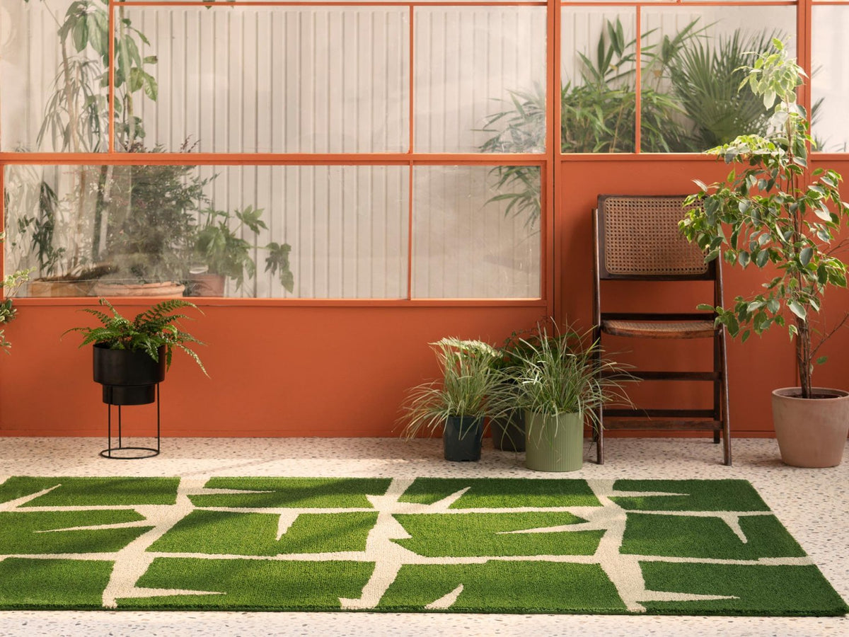 Scion Moqui Green outdoor rug on a terrace