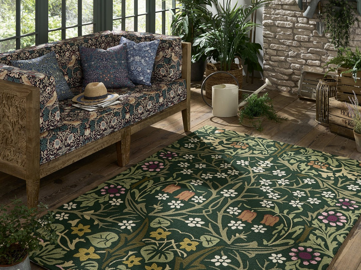 Morris & Co Blackthorn Tump outdoor rug on a terrace