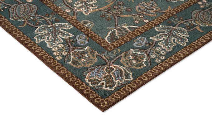 Morris & Co Theodosia Bottle Green rug corner detail