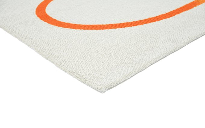 Orla Kiely Giant Linear Stem Persimmon outdoor rug corner detail
