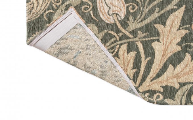 Morris & Co Compton Trellis rug corner turned to show the backing