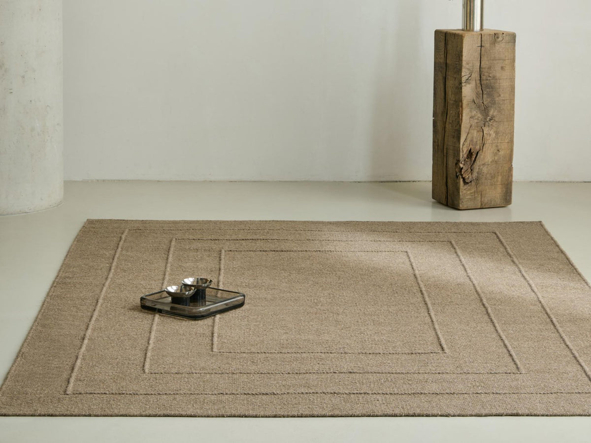 Senso Border Fur Brown rug in a room setting