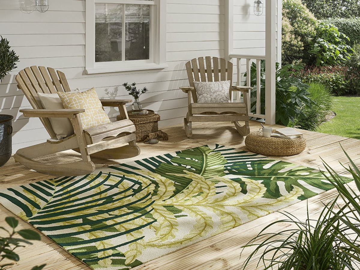 Sanderson Manila Artichoke outdoor rug on a terrace