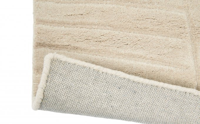 Wedgwood Folia Stone 38301 rug corner turned to show the backing