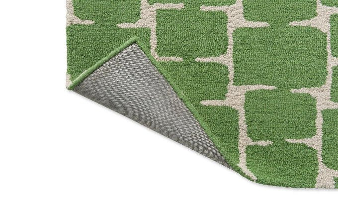 Scion Little Lohko Juniper rug corner turned to show the backing