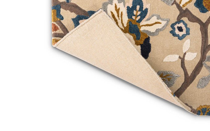 Sanderson Amanpuri Stone 145101 rug corner turned to show the backing