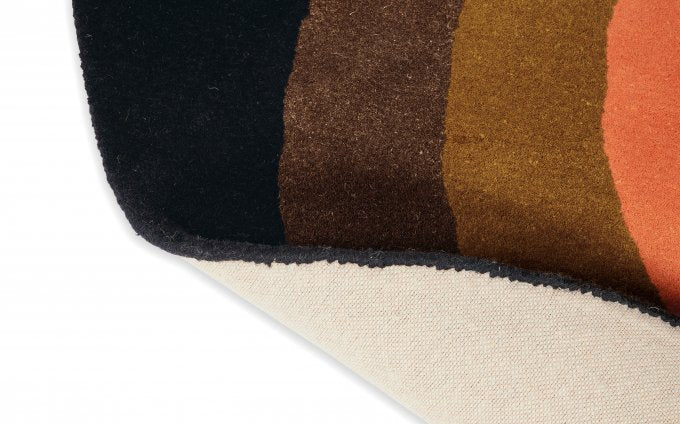 Orla Kiely Sunflower Pink Round 60005 rug turned to show the backing