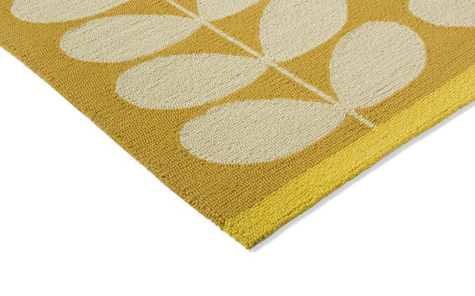 Orla Kiely Solid Stem Sunflower outdoor rug corner detail