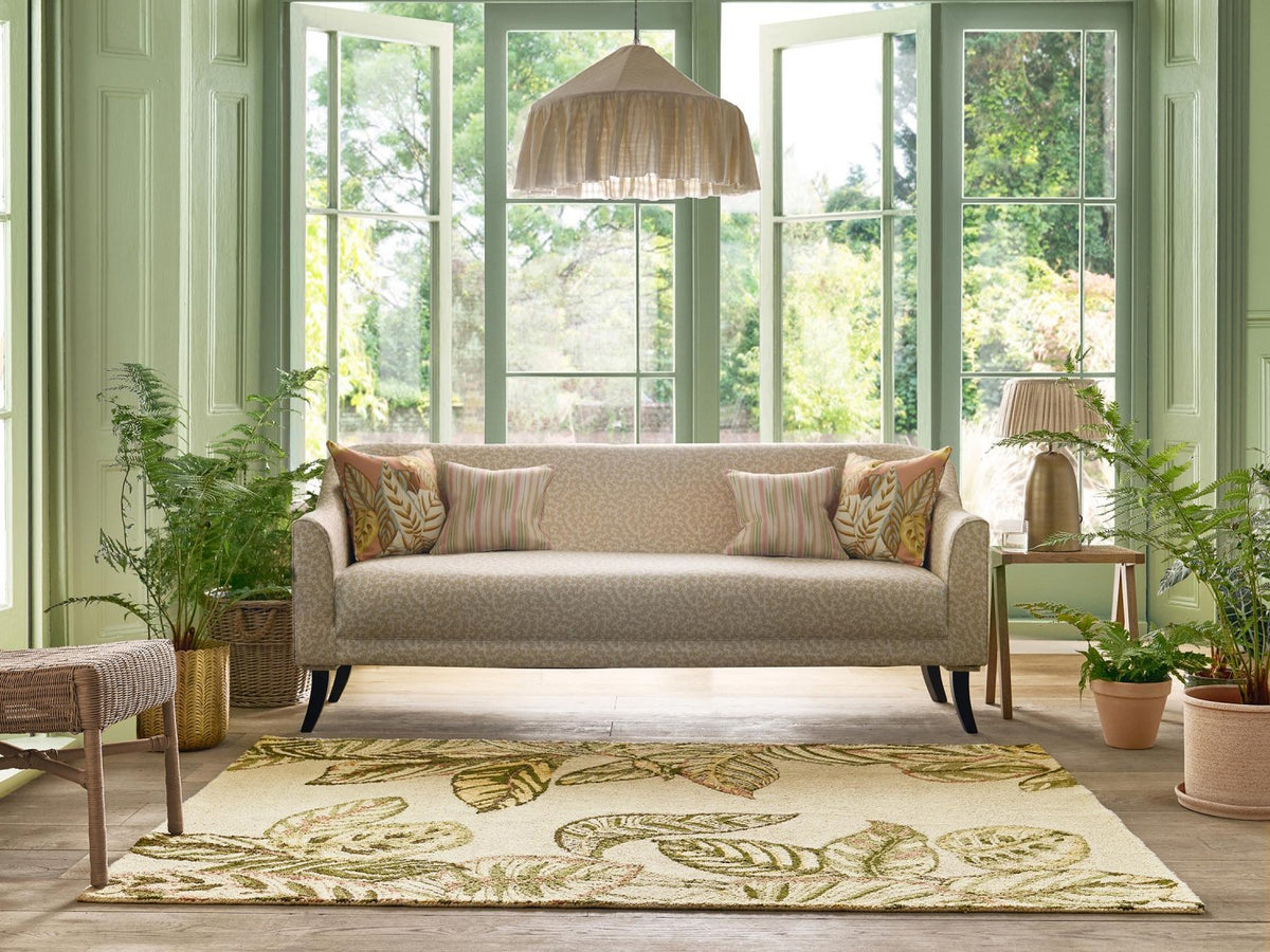 Sanderson Calathea Samphire outdoor rug styled in a room setting