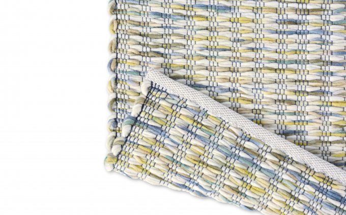 Grain Lemon rug corner turned to show the reverse