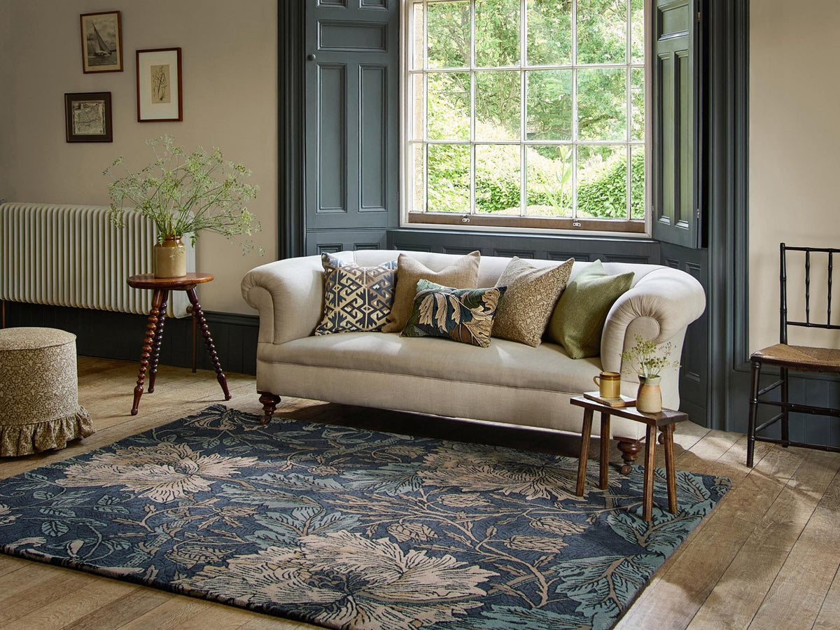 Morris & Co Honeysuckle & Tulip Woad Thyme rug styled in a room setting