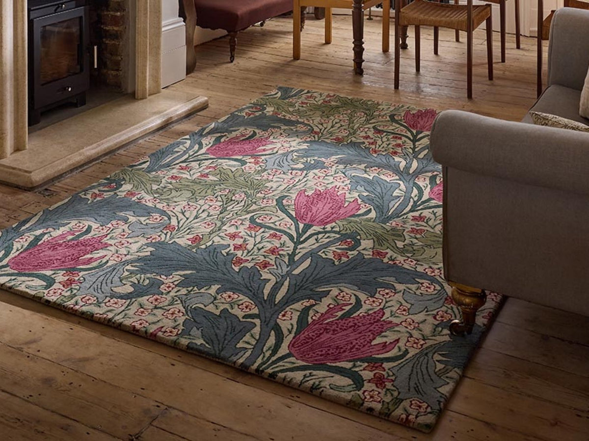 Morris & Co Lent Lily Plum Bayleaf rug styled in a room setting