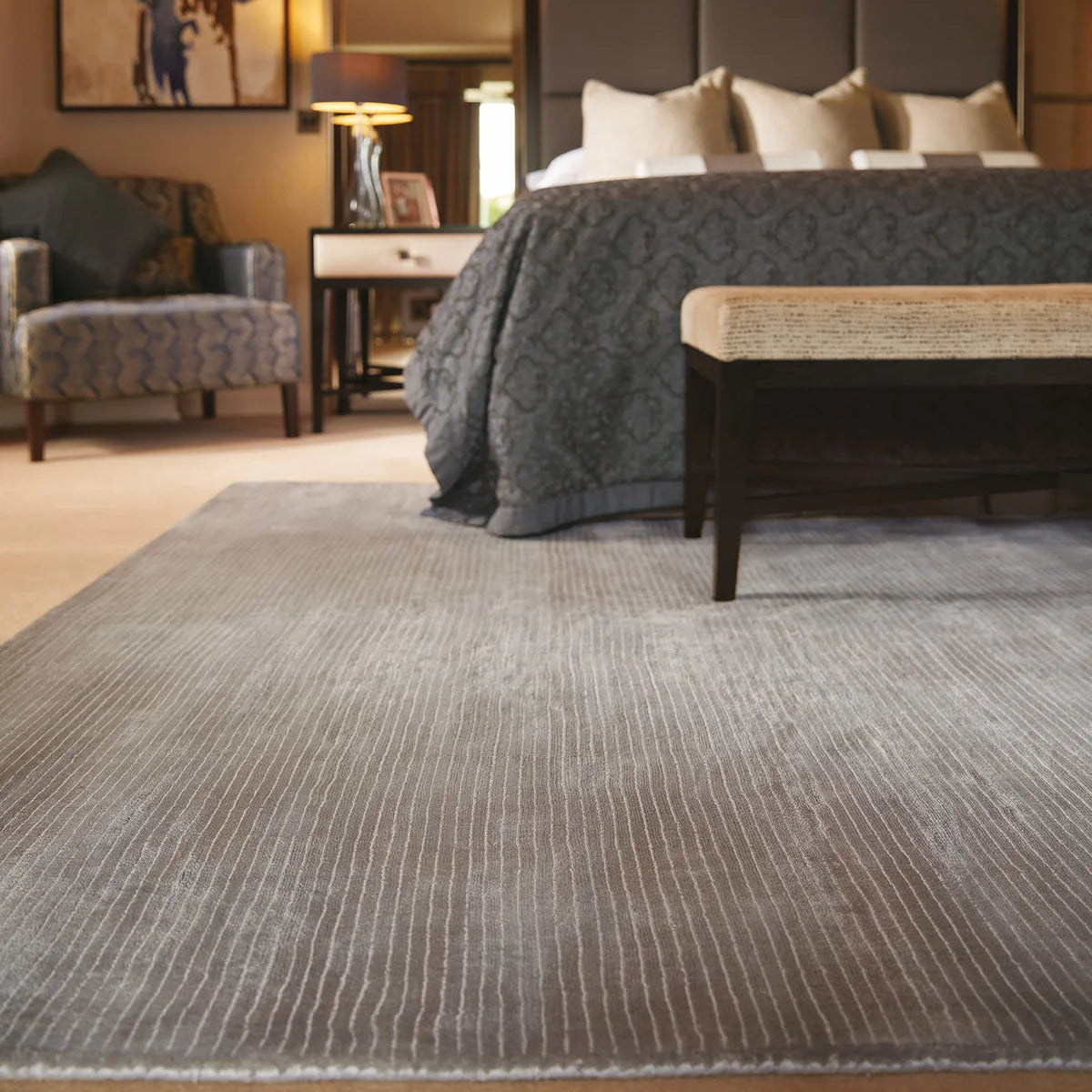 Orient Grey viscose rug styled in a room setting