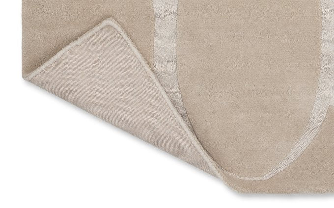 Wedgwood Renaissance Beige 39001 rug corner turned to show the backing
