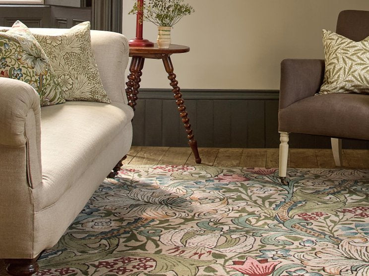 Morris & Co Golden Lily Green Red rug styled in a room setting