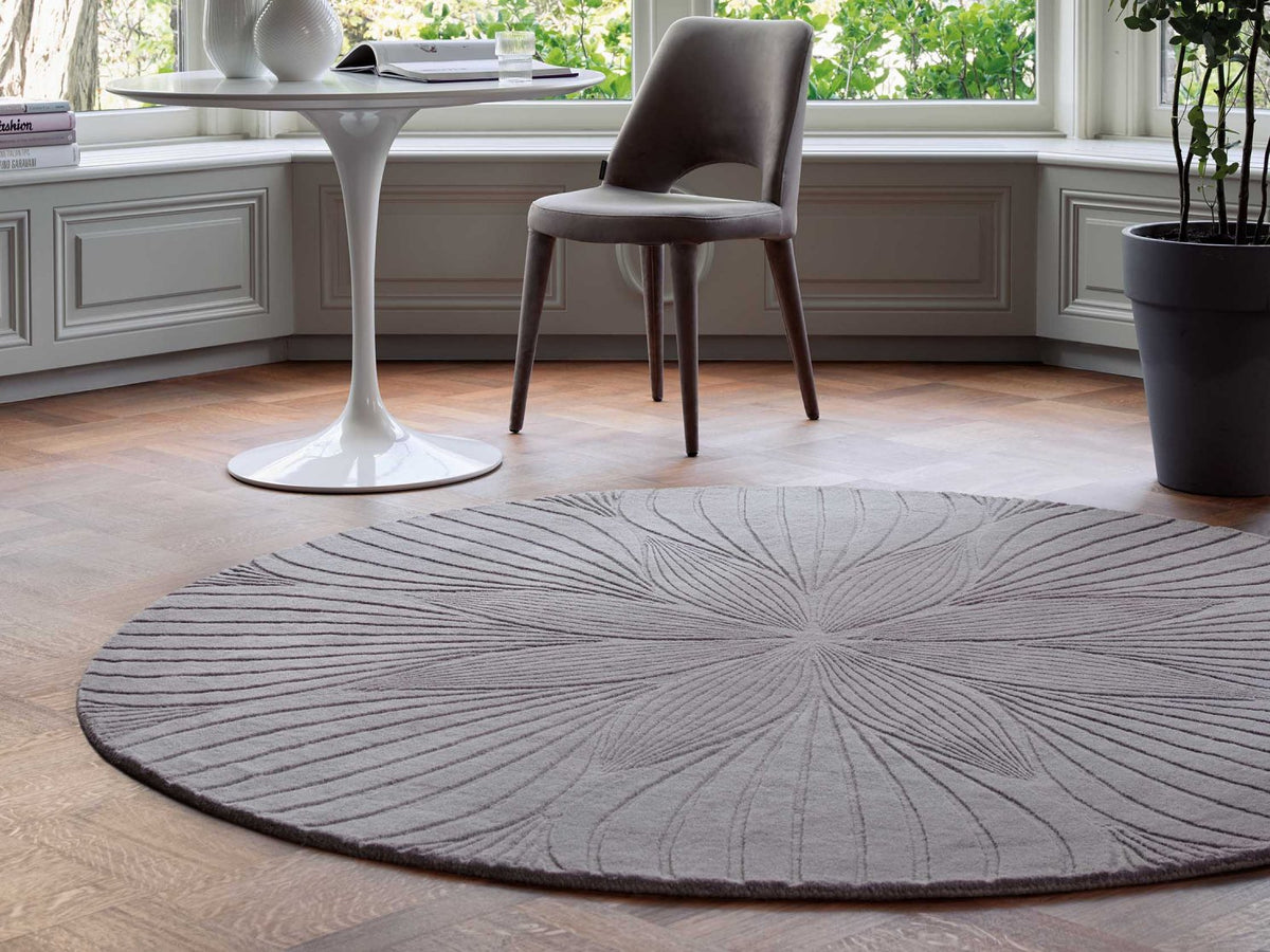 Wedgwood Folia 2.0 Cool Grey Round 38904 rug styled in a room setting