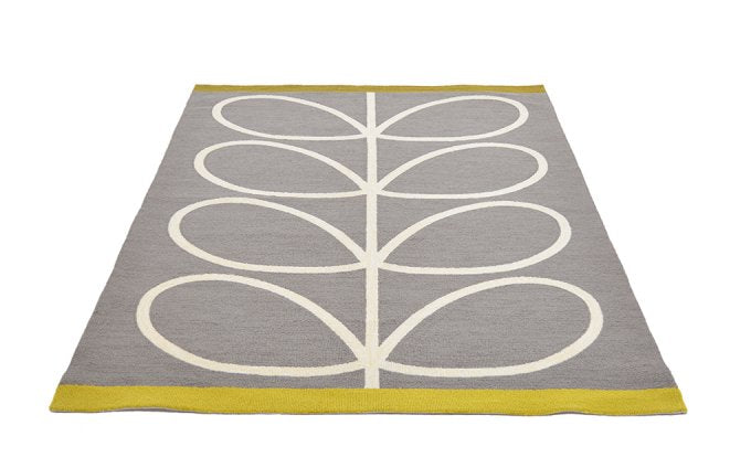 Orla Kiely Giant Linear Stem Slate outdoor rug angled view