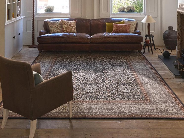 Morris & Co Borage Grey hand-knotted rug styled in a room setting