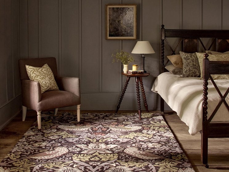 Morris & Co Strawberry Thief Grape rug styled in a room setting
