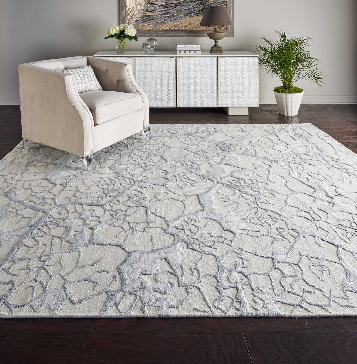 Divine DIV06 Ivory rug in a styled room setting