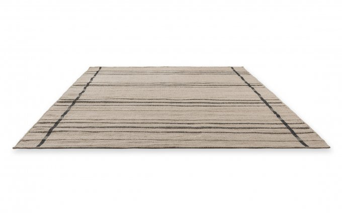 Zona Line Charcoal outdoor rug angled view