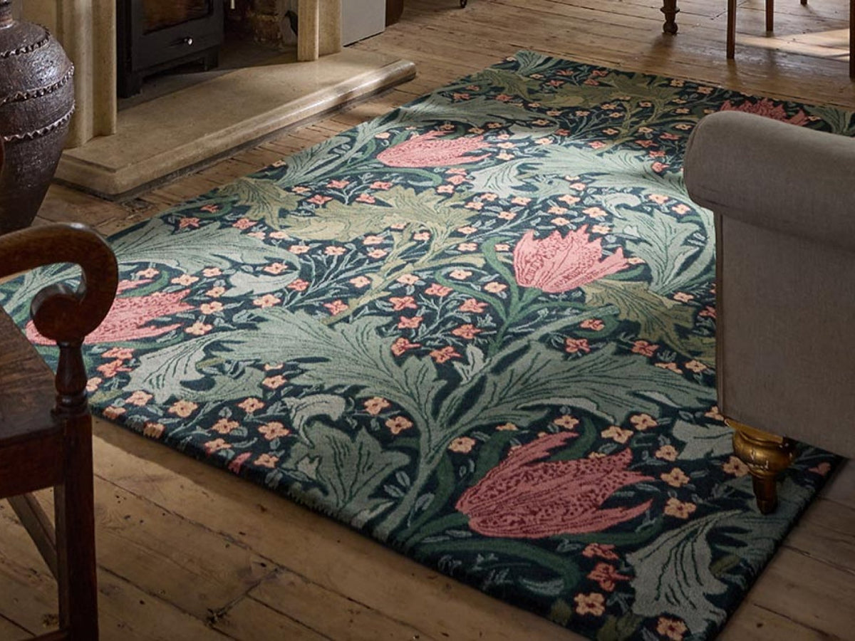 Morris & Co Lent Lily Indigo Madder rug styled in a room setting