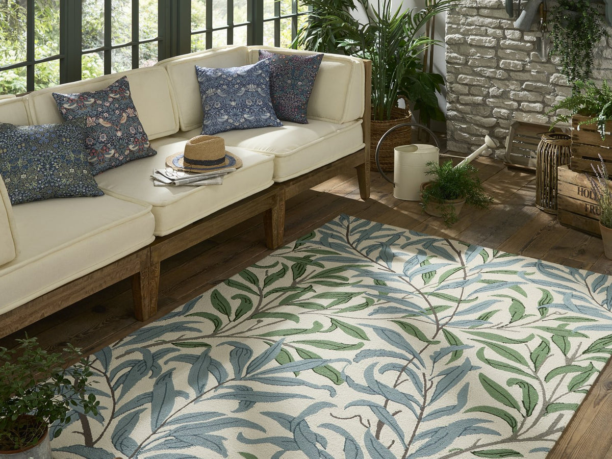 Morris & Co Willow Boughs Leafy Arbour outdoor rug on a terrace