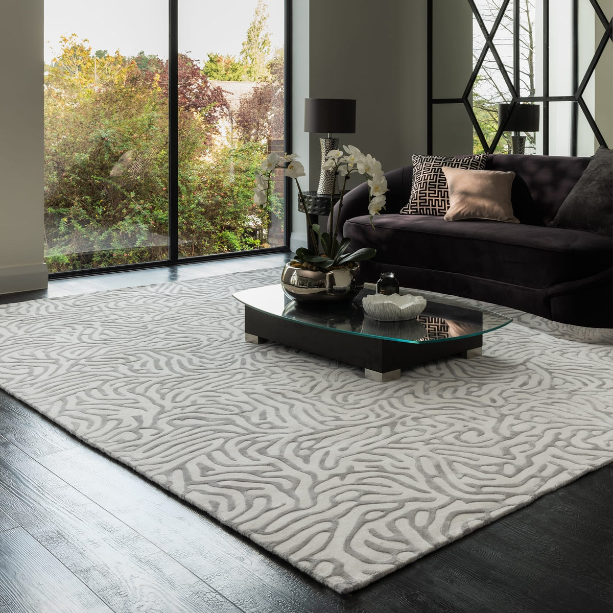 Katherine Carnaby Coral Silver rug in a living room