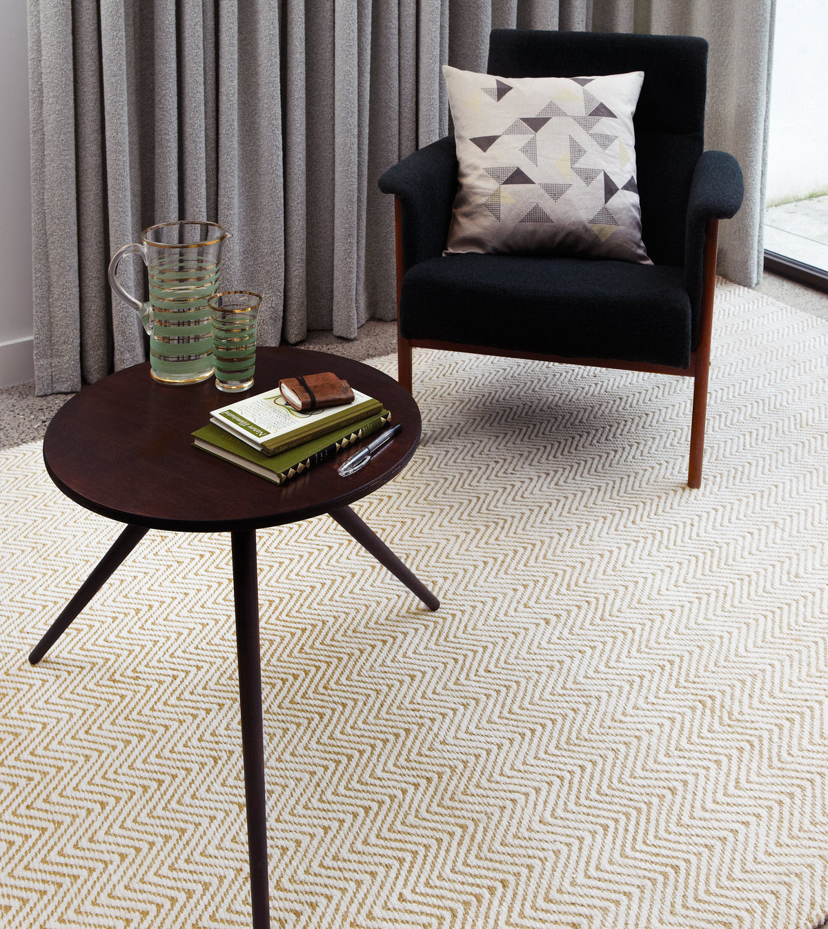 A natural-toned textured rug that softens sound in a room