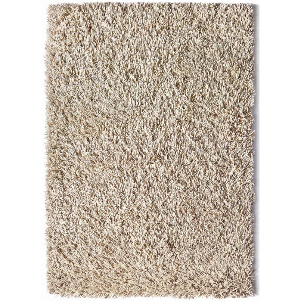 A light shaggy wool rug showing deep pile