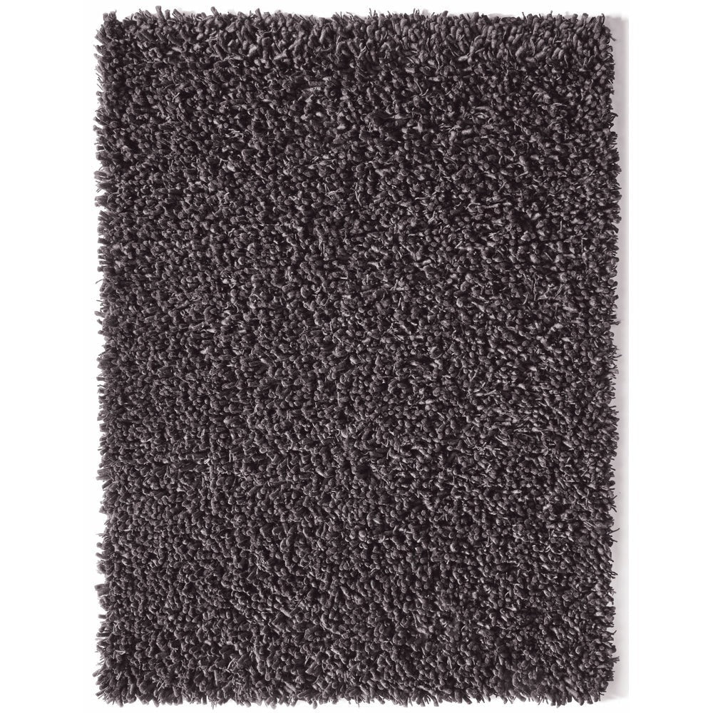 A fossil-toned hand-woven wool rug made to last