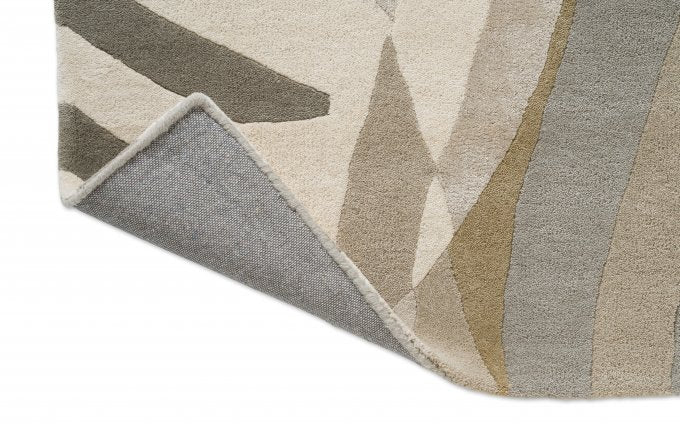 Harlequin Atelier Pebble 140801 rug corner turned to show the backing