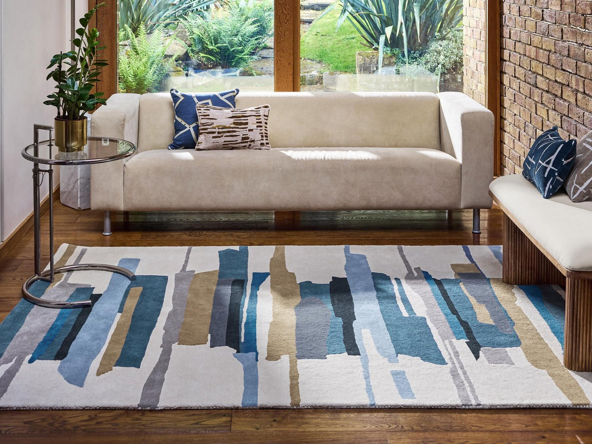Harlequin Zeal Indigo 43008 rug styled in a room setting