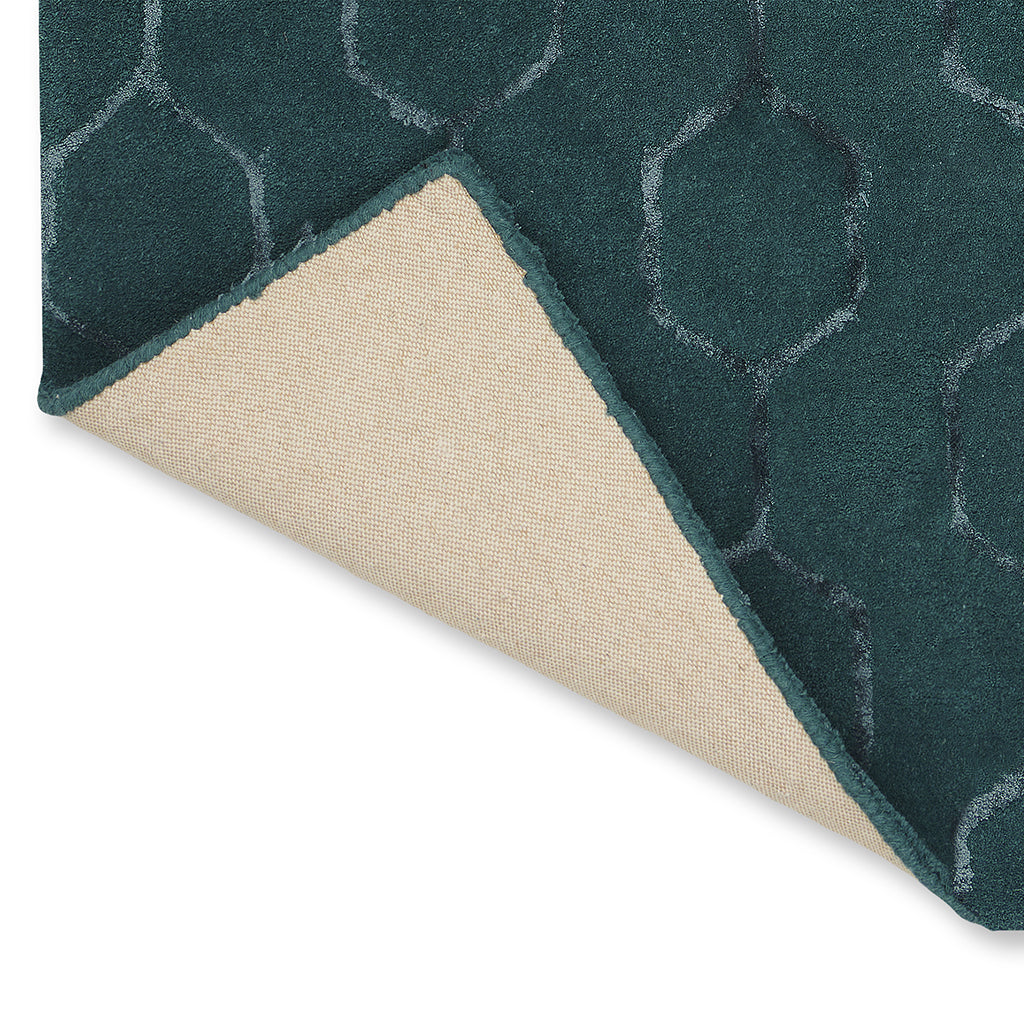Wedgwood Gio Teal 39107 rug corner turned to show the backing