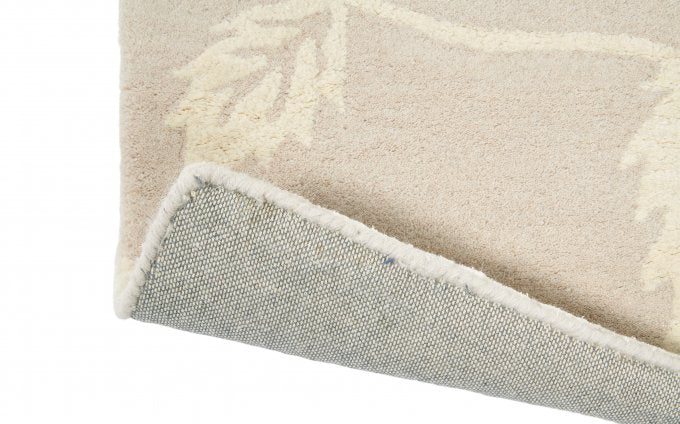 Wedgwood Wild Strawberry Tonal 38201 rug corner turned to show the backing