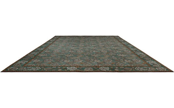 Morris & Co Theodosia Bottle Green rug angled view