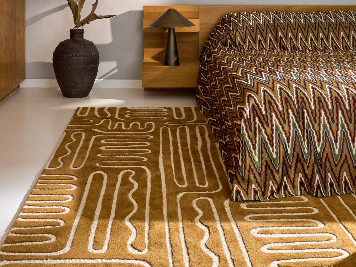 Harlequin Hollow Tan 141103 rug styled in a room setting