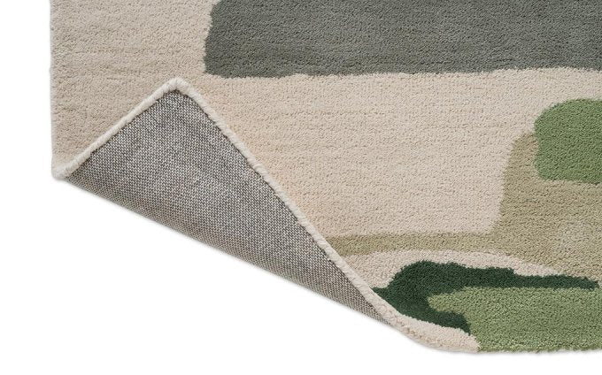 Harlequin Zeal Forest 43007 rug corner turned to show the backing