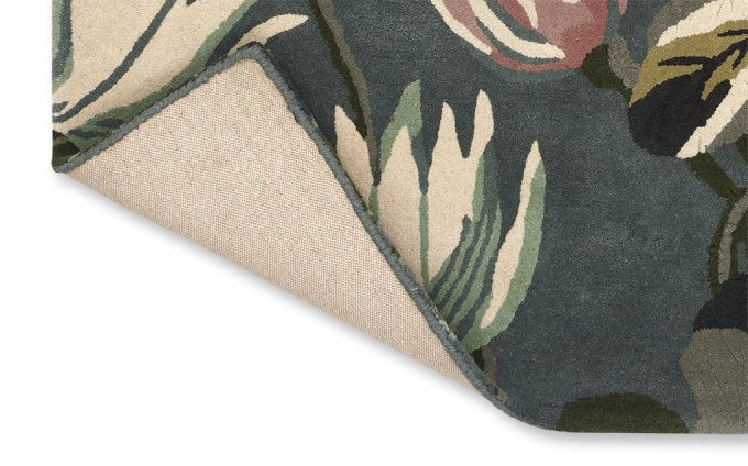 Wedgwood Waterlily Midnight Pond 38608 rug corner turned to show the backing